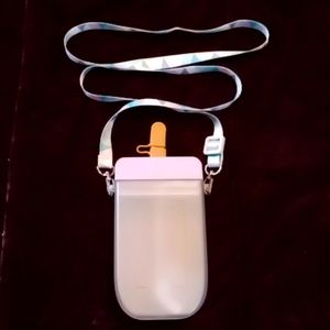 A disguised drinking container in the shape of an ice cream bar purse & straw.